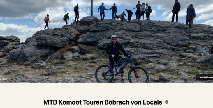 Mountainbiker unten - oben Wanderer auf Gipfel